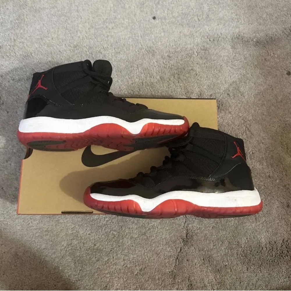 Air Jordan 11 Retro Black/Red Sneakers